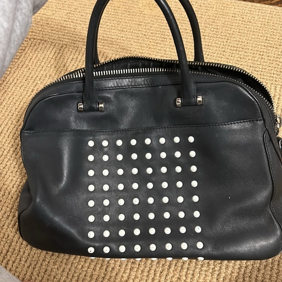 Good condition. Pockets on the inside and outside. Fits lot of stuff inside. - Picture 2 of 5